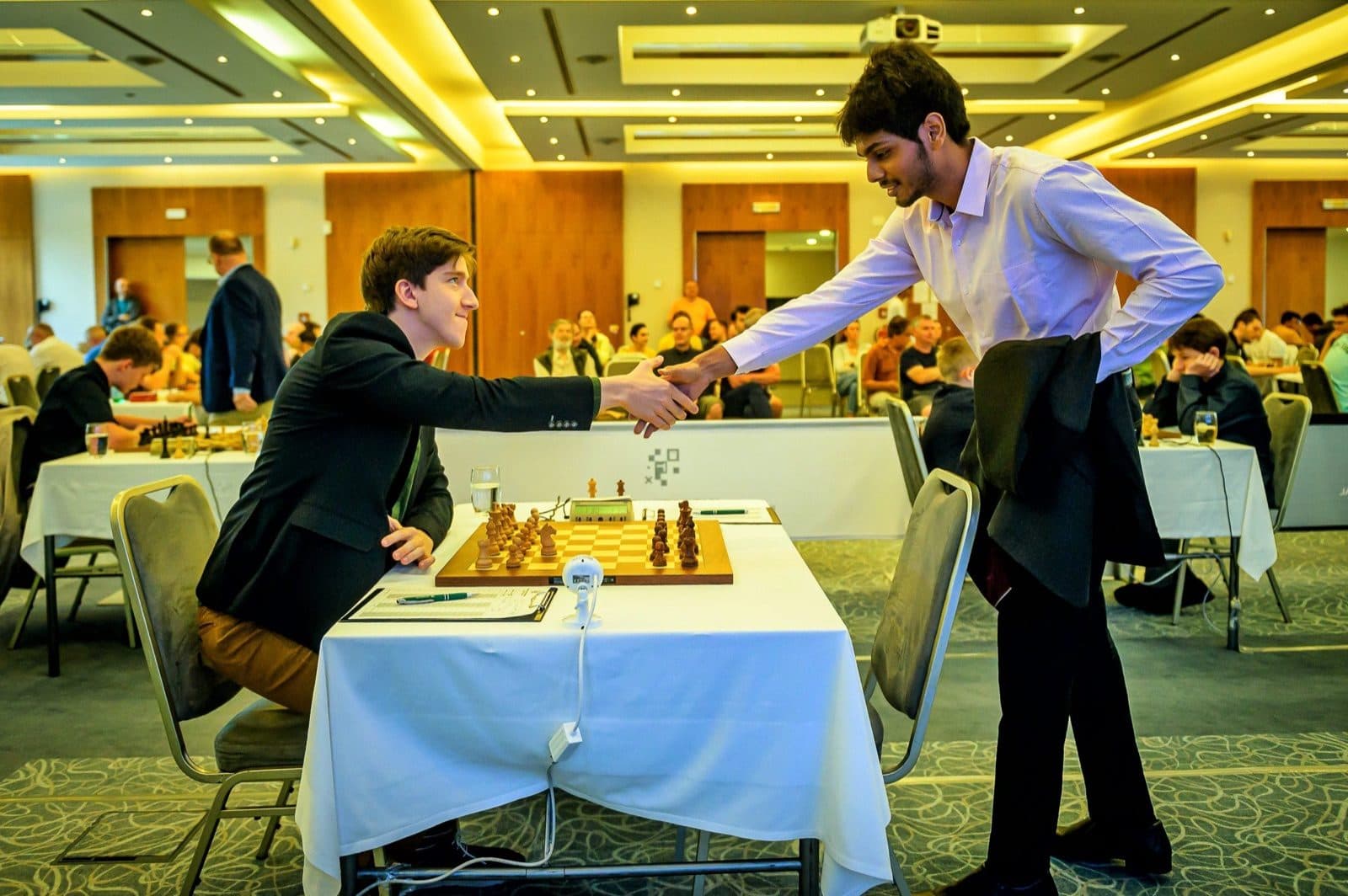 GM Akash Ganesan shaking hands during Prague Challengers