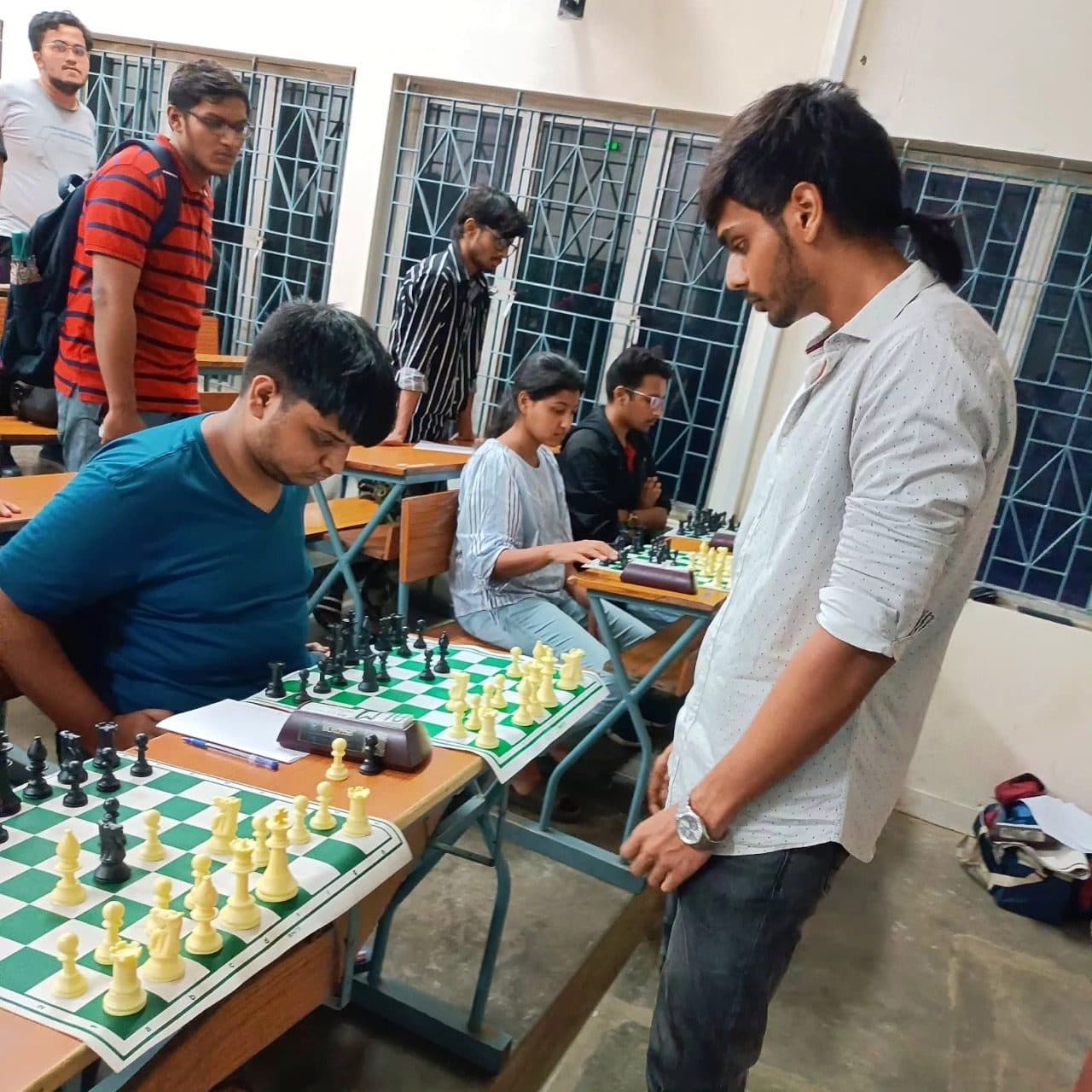 GM Akash Ganesan playing a simultaneous chess exhibition at IIT Madras
