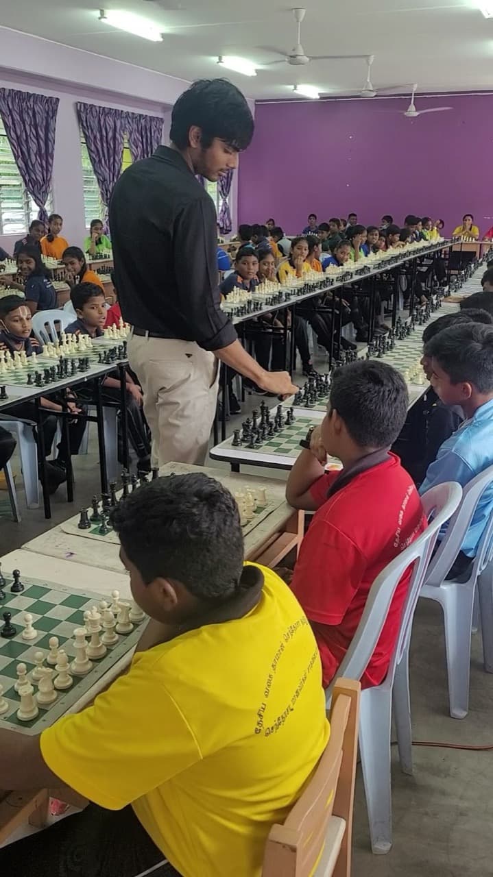 GM Akash Ganesan playing a simultaneous exhibition in Malaysia